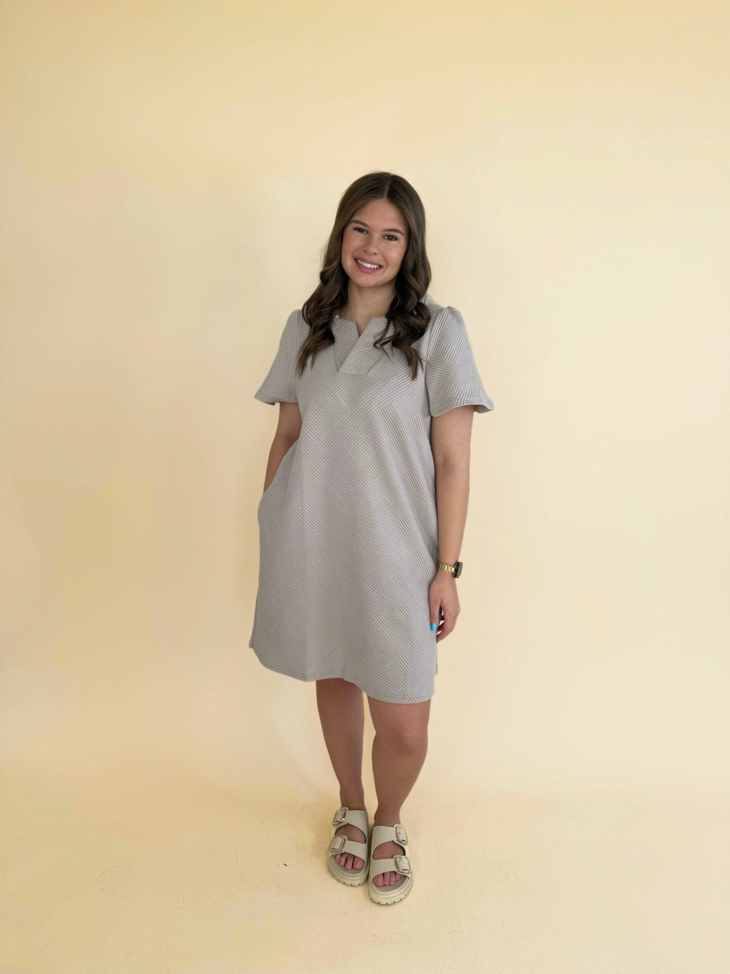 Arlette Collared Textured Dress in oatmeal knee length shift dress with collar and short sleeves styled with neutral sandals