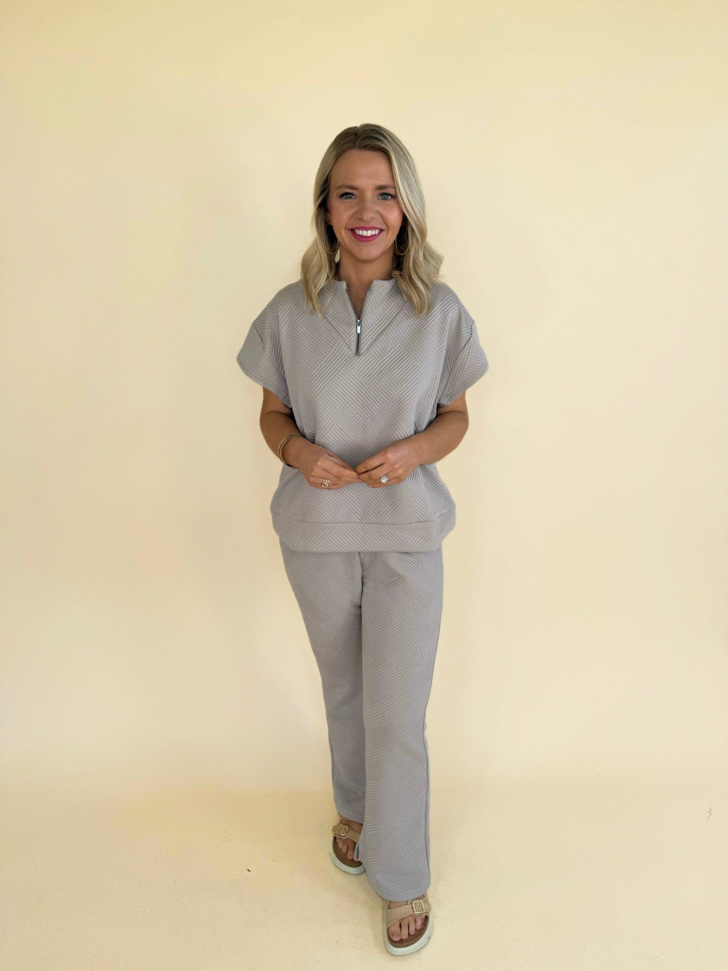 Corinne Textured Set oatmeal textured two piece outfit with half zip neckline and stretch pants