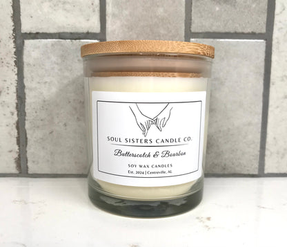 Scented candle with a wooden lid on a tiled surface