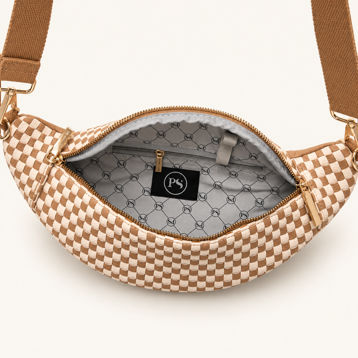Open Checkered Tan Woven Susie Bum Bag showing interior pockets and patterned lining.