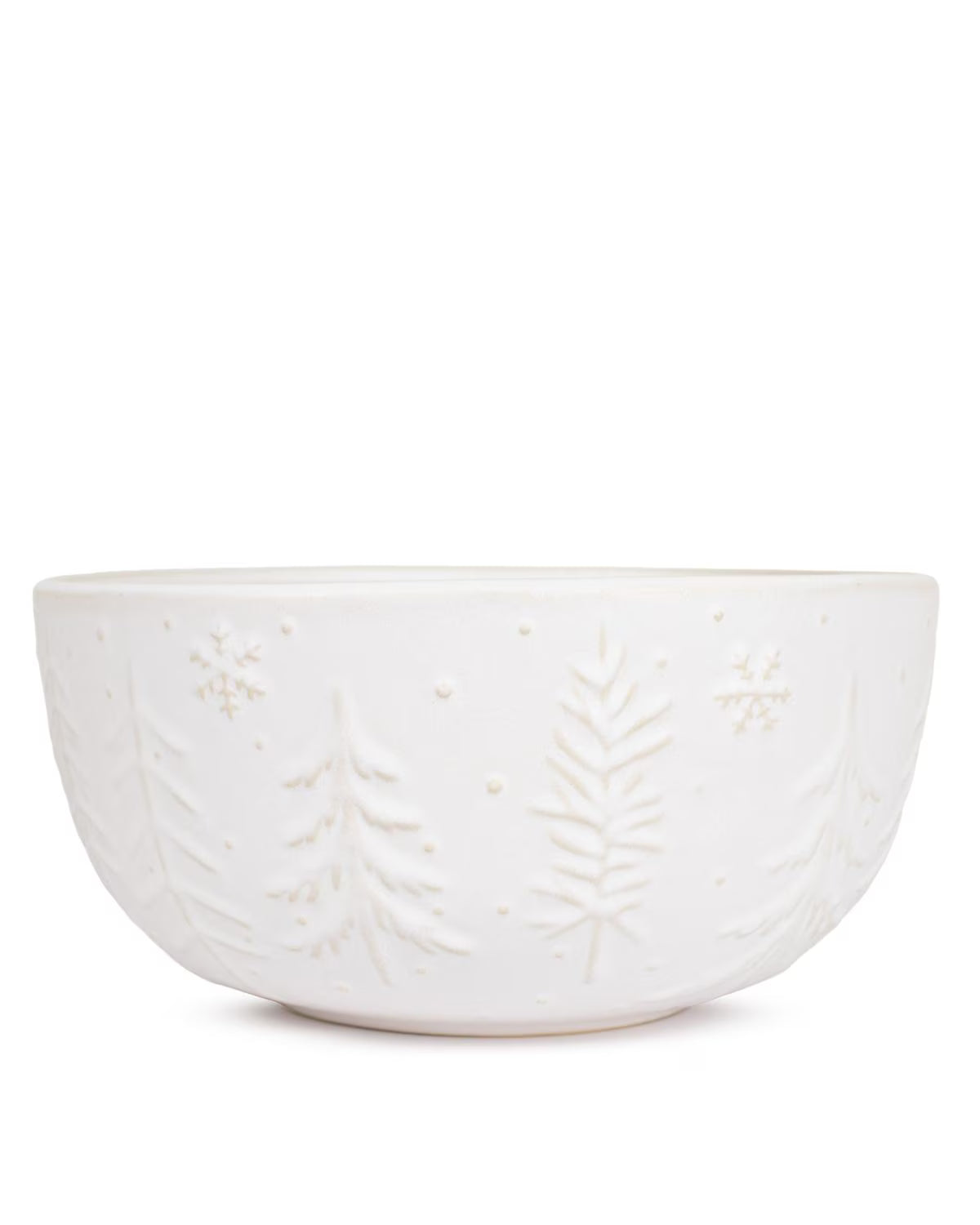 White ceramic bowl with leaf patterns on a white background