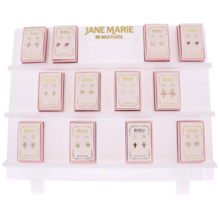 Jane Marie 18K gold-plated kids stud earring display featuring multiple pink boxed sets with assorted styles including hearts, crosses, butterflies, pearls, and colorful designs arranged on a white branded stand.