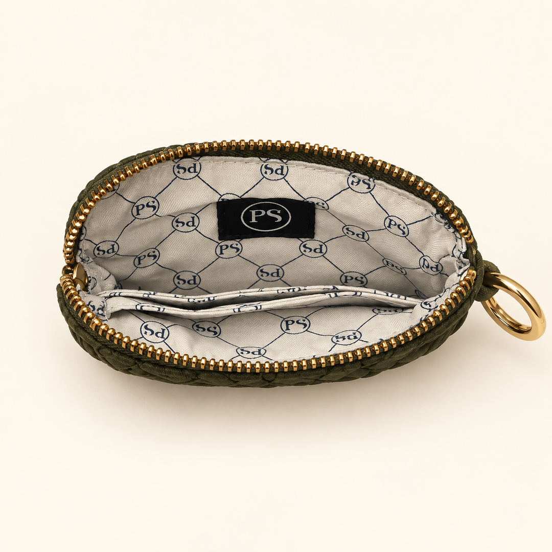 Open Suede Paris Card Wallet in olive showing its compact interior and patterned lining.
