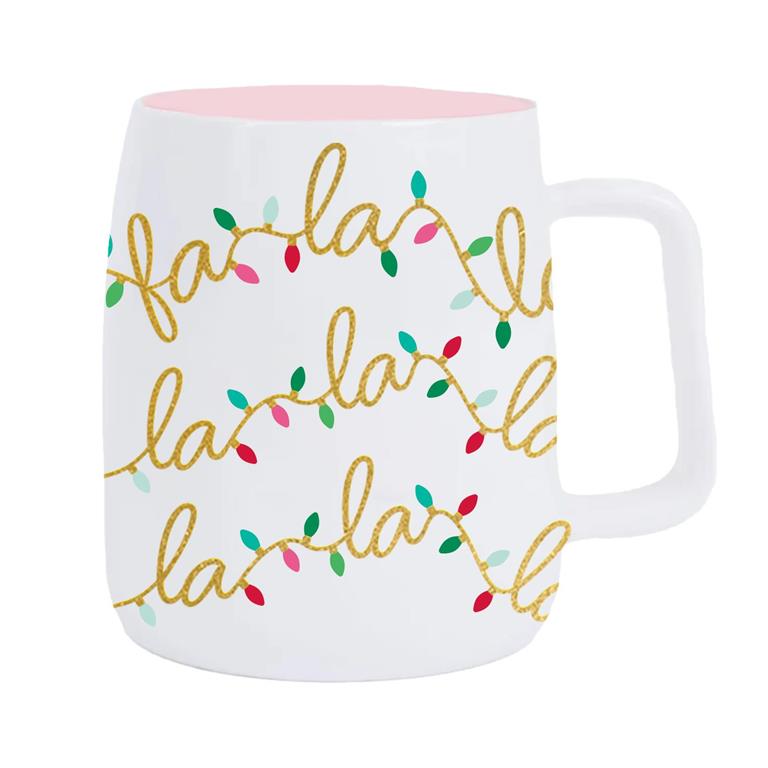 White mug with 'fa la la la' text and colorful lights design on a white background