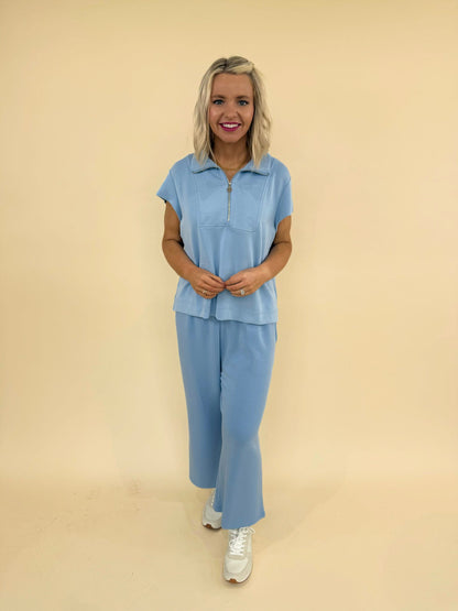 CloudSilk Weekend Set in soft blue modal blend featuring cap sleeve zip collar top and cropped drawstring pants with pockets