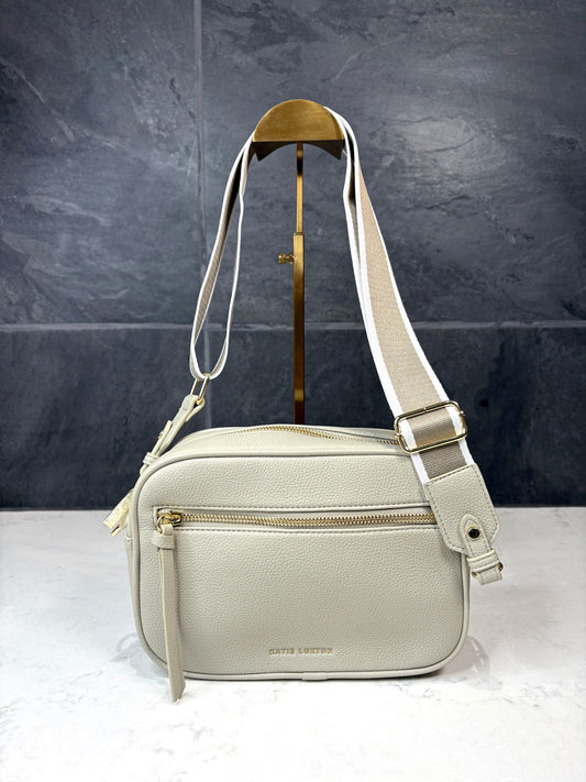 Hallie Crossbody Bag in green mist vegan leather with gold hardware and adjustable crossbody strap