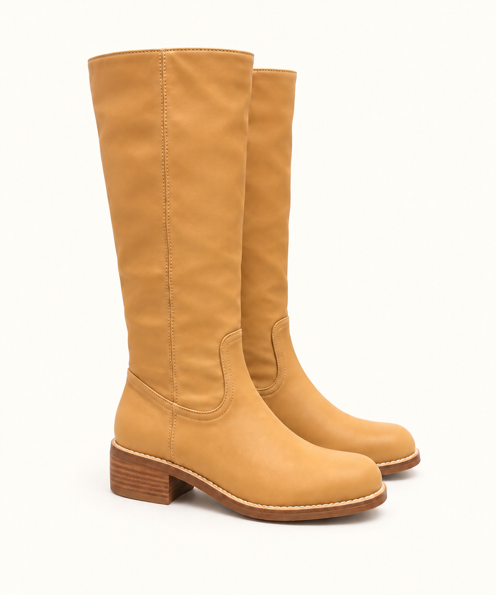 Corkys Put Up or Shut Up camel knee-high boots shown together in an angled side view.