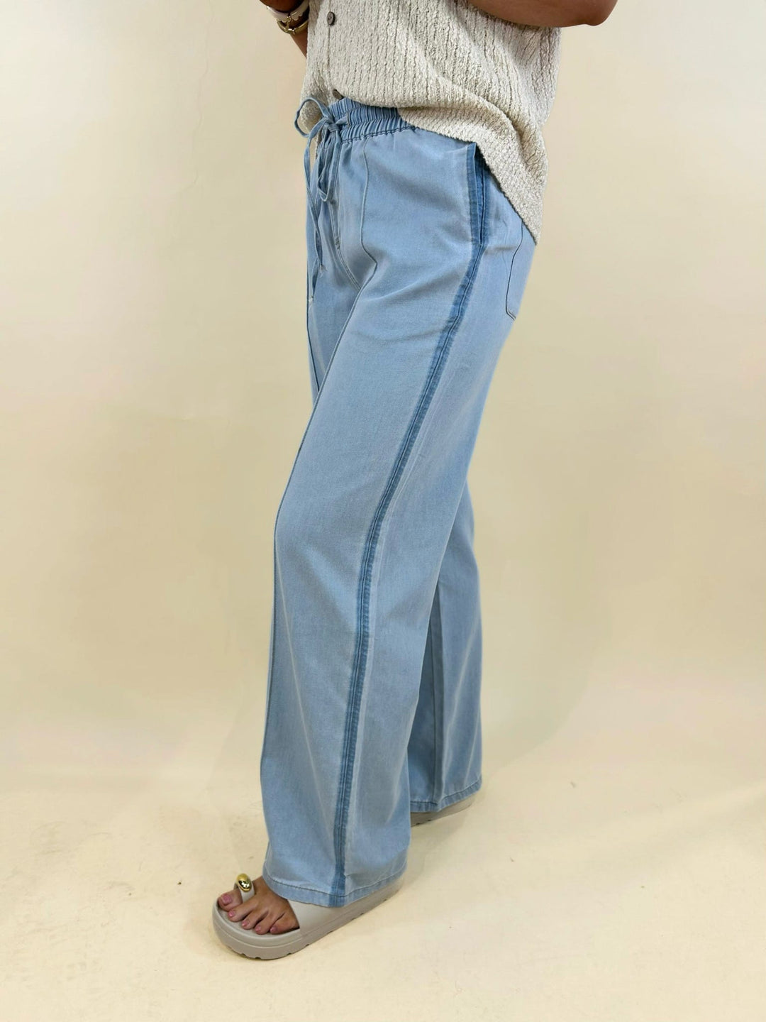 Light blue wide leg denim pants side view, women&