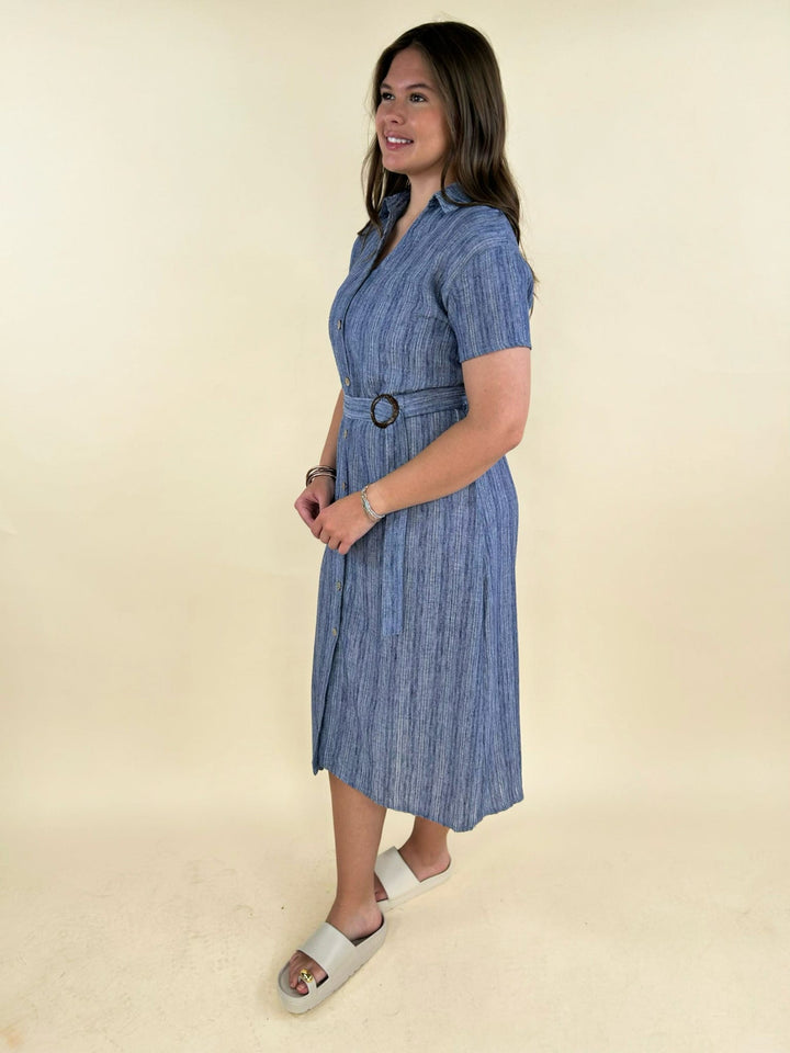 Side view of blue striped belted midi shirtdress with button front, short sleeves, casual everyday dress styling