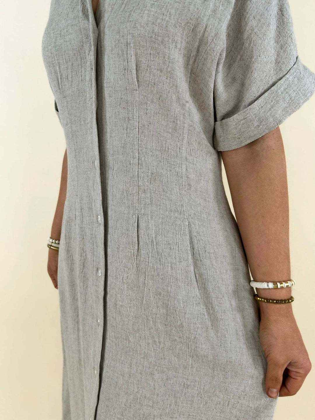 neutral midi shirt dress close up front detail lightweight fabric button front casual women’s dress