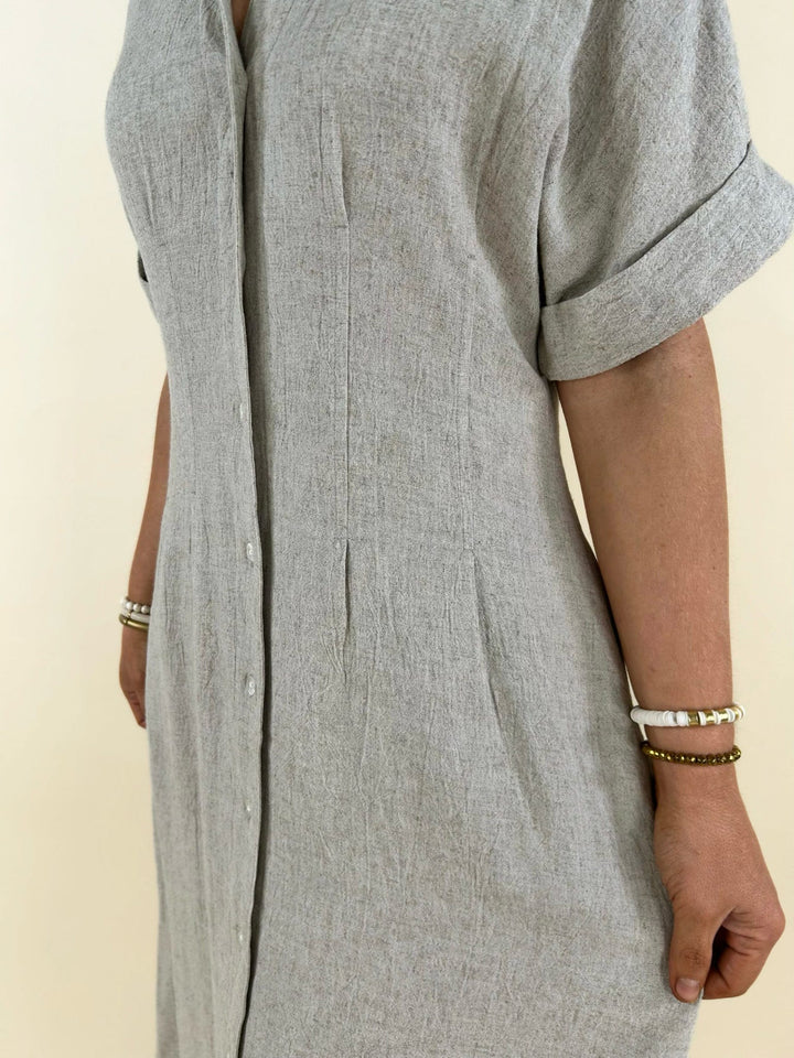 neutral midi shirt dress close up front detail lightweight fabric button front casual women’s dress