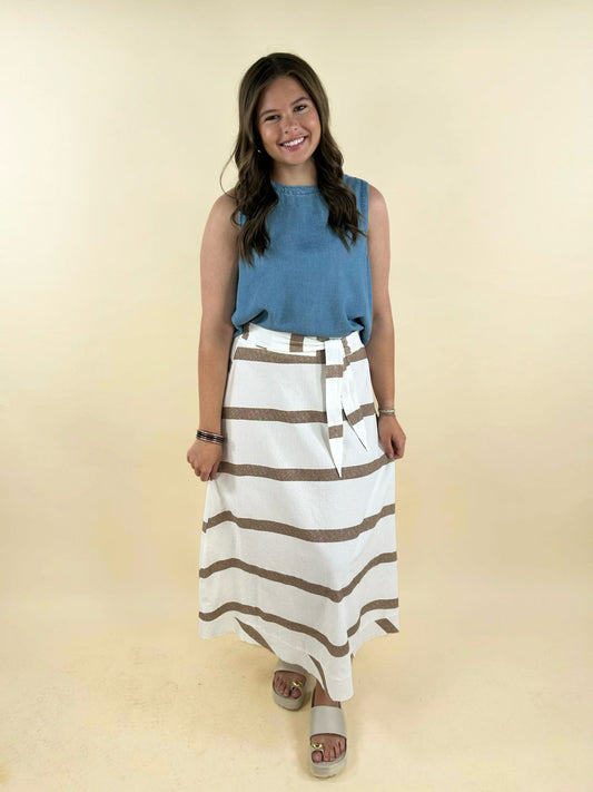 white and taupe striped midi skirt full front view flowy hemline summer outfit women’s boutique fashion