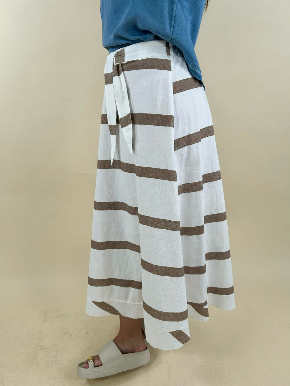 white and taupe striped midi skirt side view with tie waist detail lightweight flowy summer skirt
