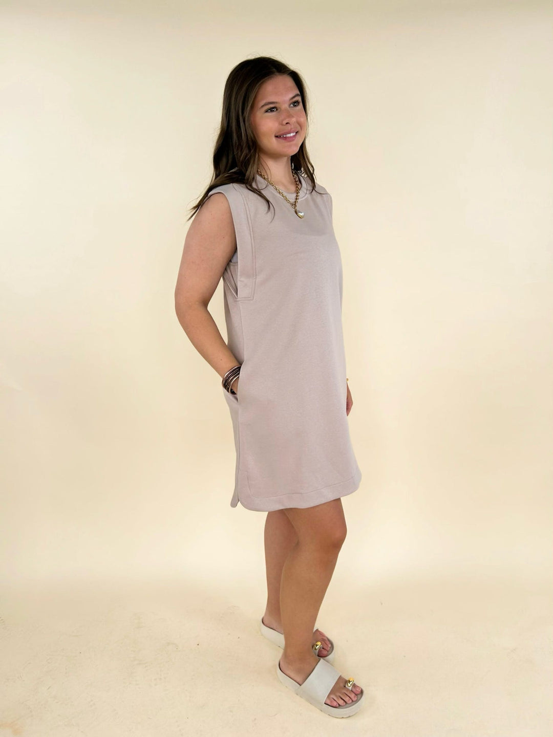 Taupe sleeveless mini dress side view casual outfit with sandals womens boutique style