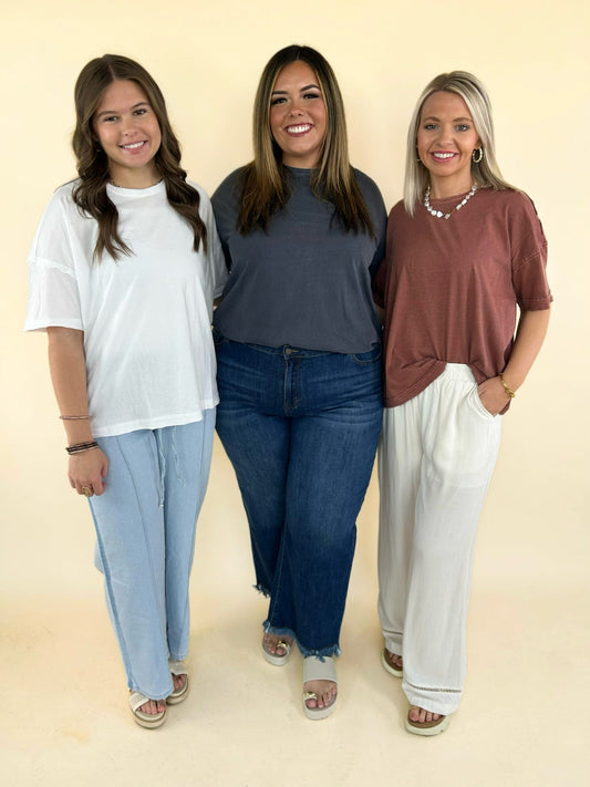 women’s boutique graphic tee outfits group photo casual oversized t shirts denim jeans wide leg pants