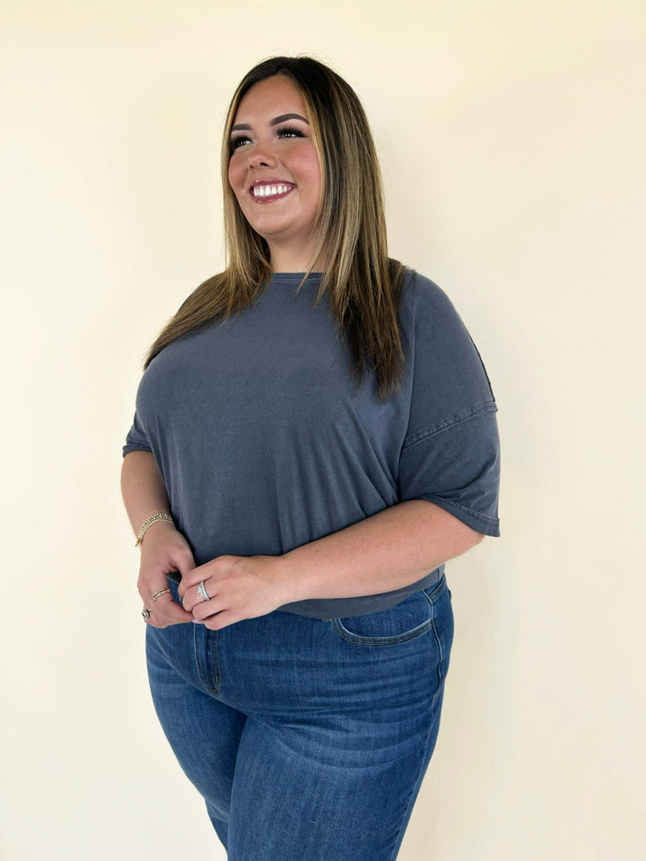 charcoal oversized tee styled with denim jeans relaxed fit casual women’s boutique outfit