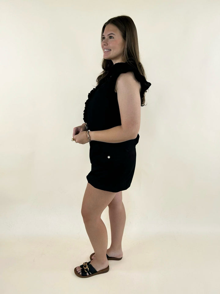 Black ruffle sleeve blouse and matching shorts set featuring lace trim details, lightweight fabric, and polished casual styling