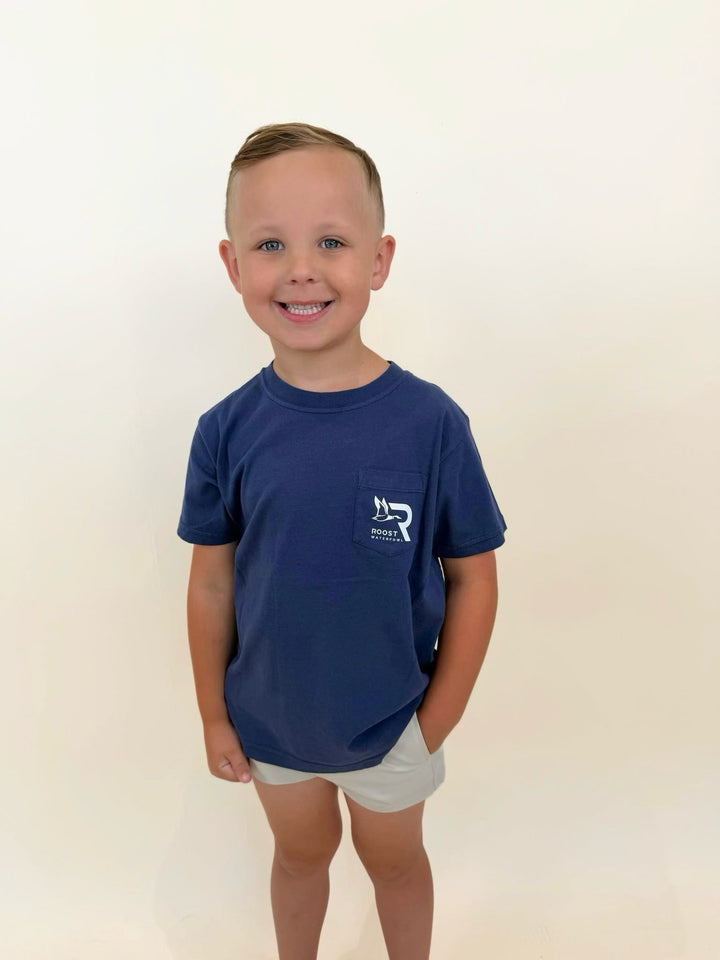 Roost Waterfowl youth pocket t-shirt, boys navy blue graphic tee, southern outdoor apparel for kids, youth hunting lifestyle shirt, boys casual pocket tee, waterfowl clothing for children