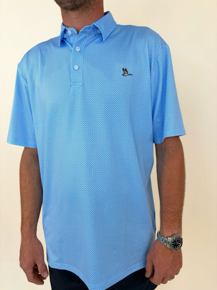 Light blue micro print performance polo, men’s golf polo shirt, Roost Waterfowl embroidered duck logo polo, breathable performance apparel, men’s athletic fit polo, southern menswear, lightweight summer golf shirt