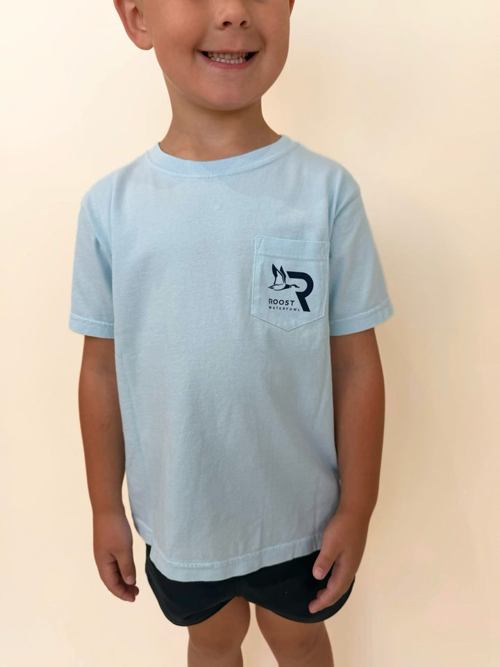 Roost Waterfowl youth pocket t-shirt, boys light blue hunting shirt, kids outdoor graphic tee, youth waterfowl apparel, boys casual pocket tee, southern boys clothing, Roost Waterfowl logo shirt