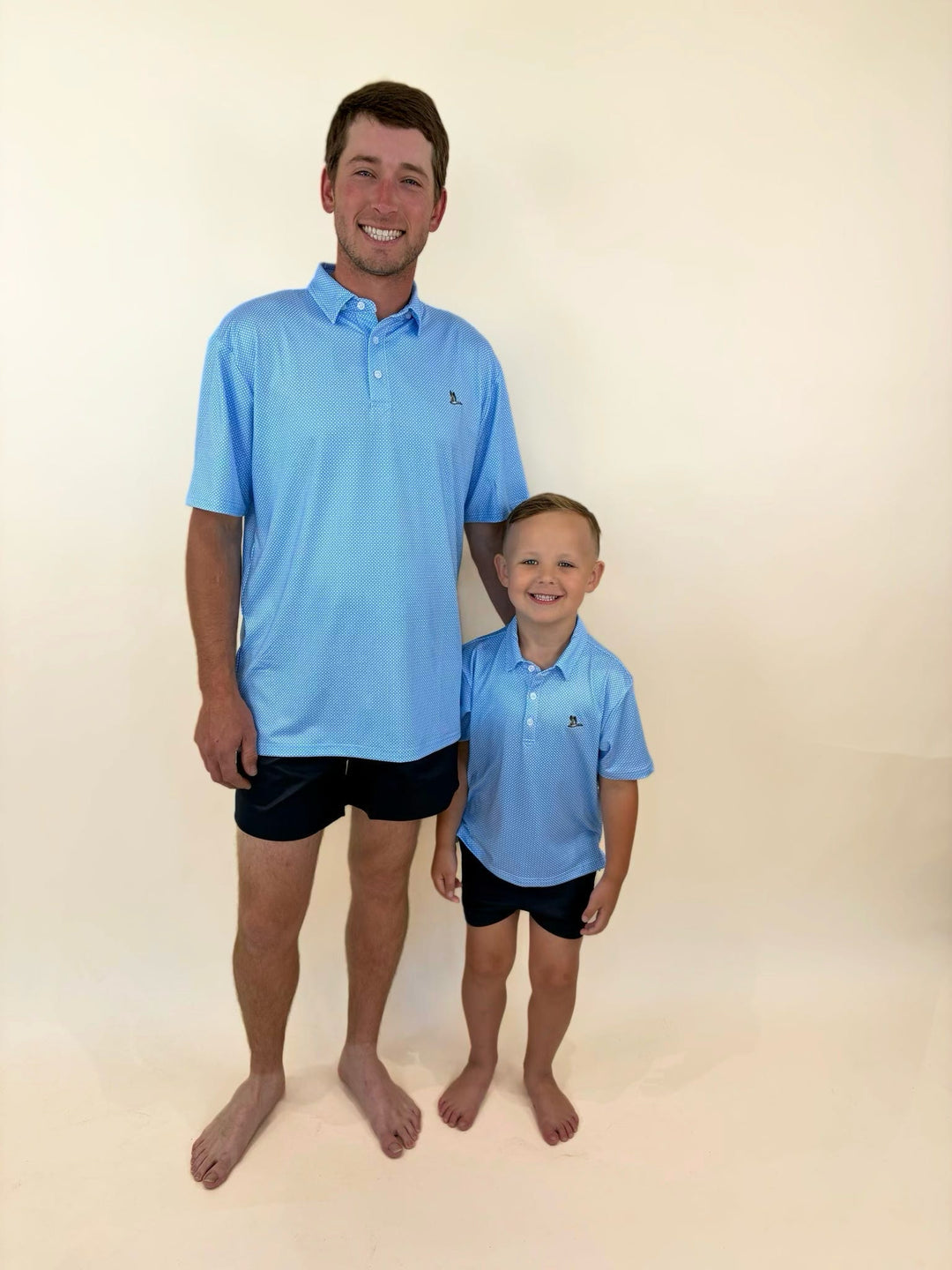 Matching father and son golf polos, daddy and me polo shirts, matching family golf apparel, coordinated father son outfits, Roost Waterfowl polos, matching blue performance polos, family country club style clothing, father son matching outfits