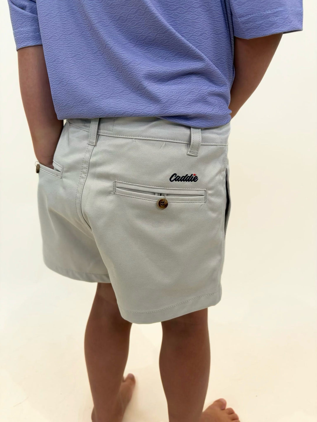 Youth stone golf shorts, boys khaki golf shorts, light gray boys dress shorts, Caddie youth apparel, boys performance golf bottoms, country club style shorts, boys southern clothing, classic youth golf shorts