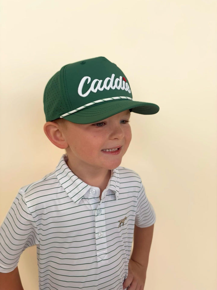 Youth green Caddie rope hat styled with striped golf polo, boys golf hat, performance outdoor cap, southern youth apparel, classic golf lifestyle look