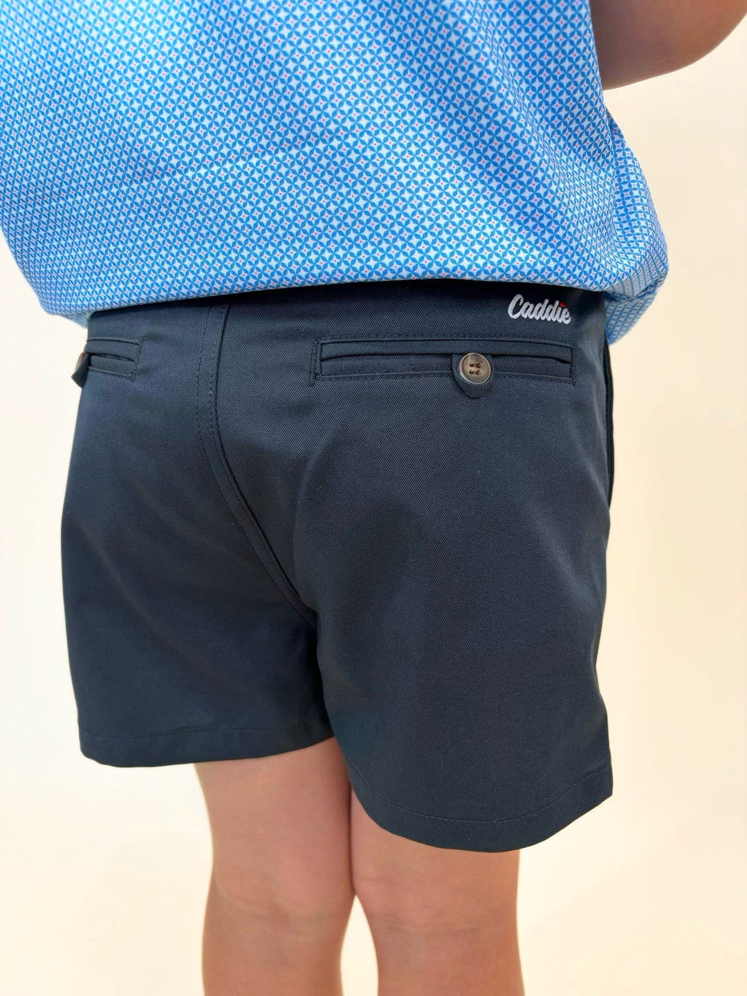 Boys navy chino golf shorts, youth golf outfit bottoms, Caddie embroidered shorts, boys performance shorts, classic youth golf apparel, boys country club fashion, navy dress shorts for boys, youth summer shorts