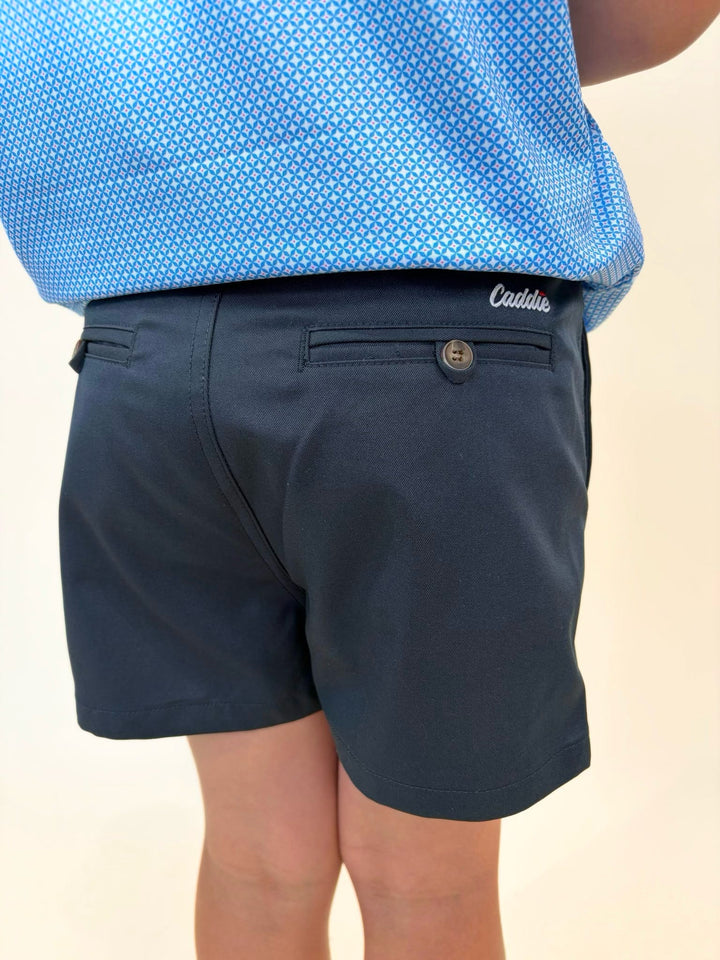 Boys navy chino golf shorts, youth golf outfit bottoms, Caddie embroidered shorts, boys performance shorts, classic youth golf apparel, boys country club fashion, navy dress shorts for boys, youth summer shorts
