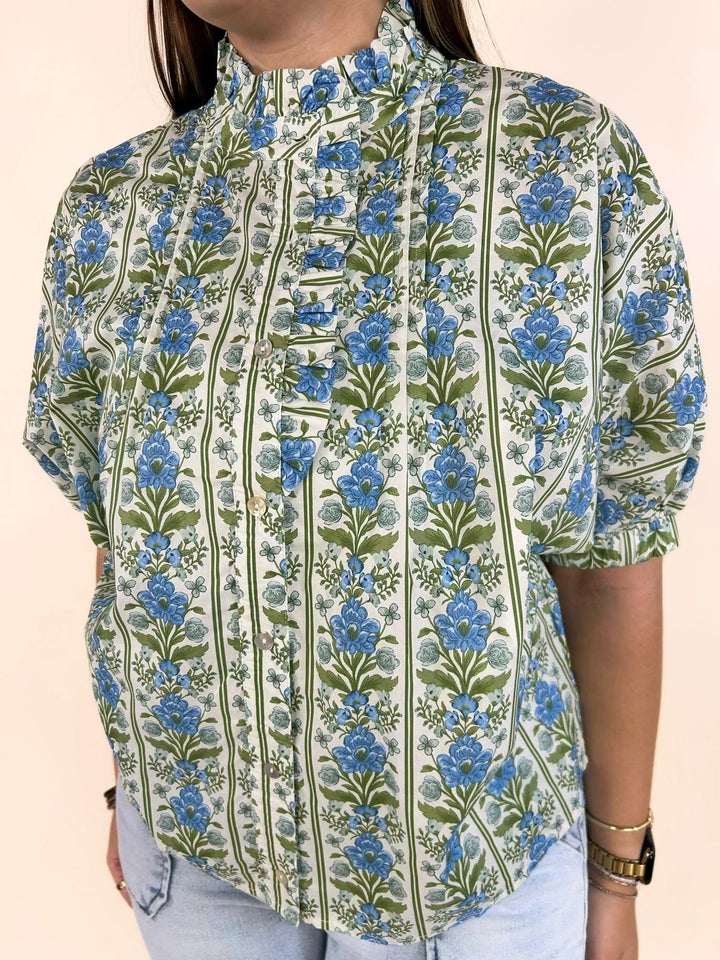 Blue floral botanical print woven blouse with elastic sleeve cuffs and relaxed fit