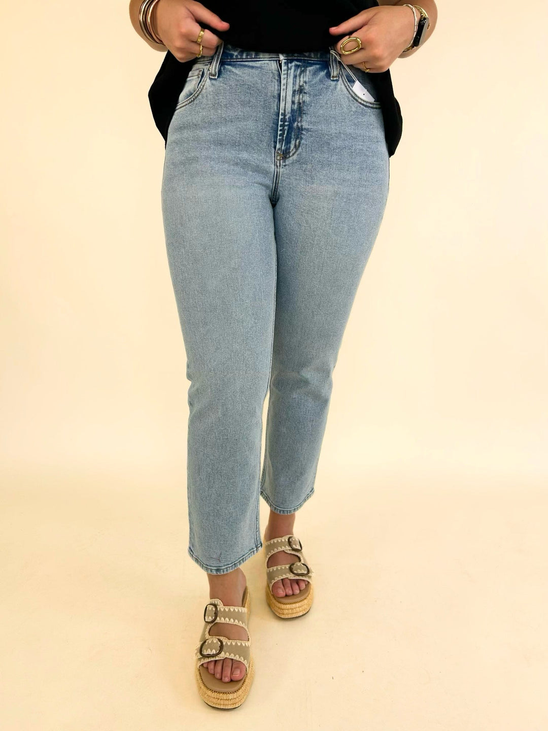 Women's Dear John Anika straight leg jeans in Tribute light wash with a mid-rise waist and ankle-length hem.