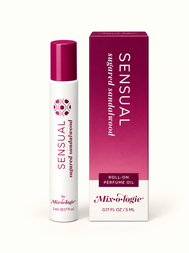 Mixologie Sensual Sugared Sandalwood 5 mL roll-on perfume oil with magenta cap and pink-purple gradient packaging on a cream background.