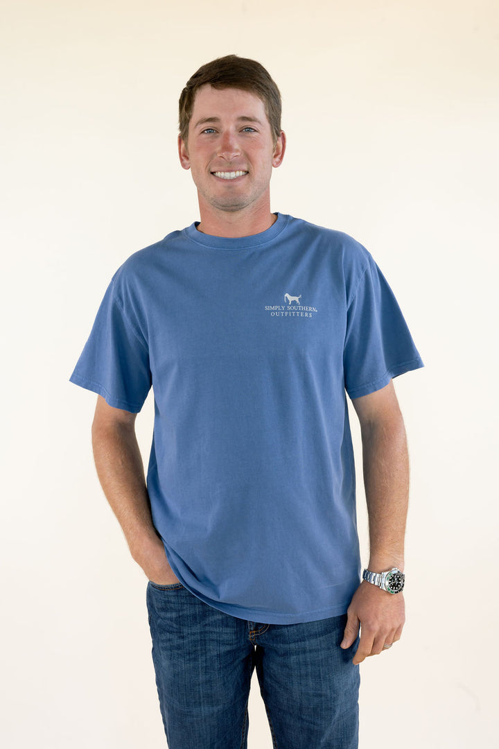 Front view of blue Simply Southern men’s T-shirt featuring crew neckline, short sleeves, relaxed fit, and small chest graphic