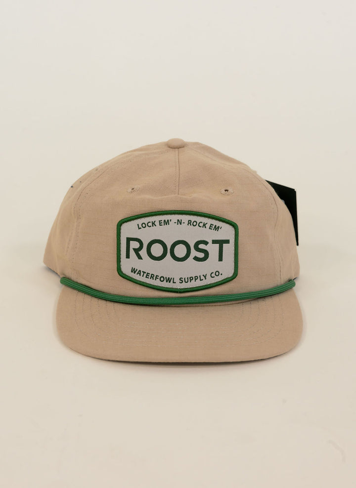 Roost Waterfowl Supply Co. tan snapback hat featuring green rope trim and embroidered “Lock Em’ N Rock Em’” Roost logo patch