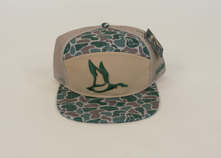 Tan and green camouflage waterfowl trucker hat featuring embroidered green duck logo, camo flat bill, and tan mesh back