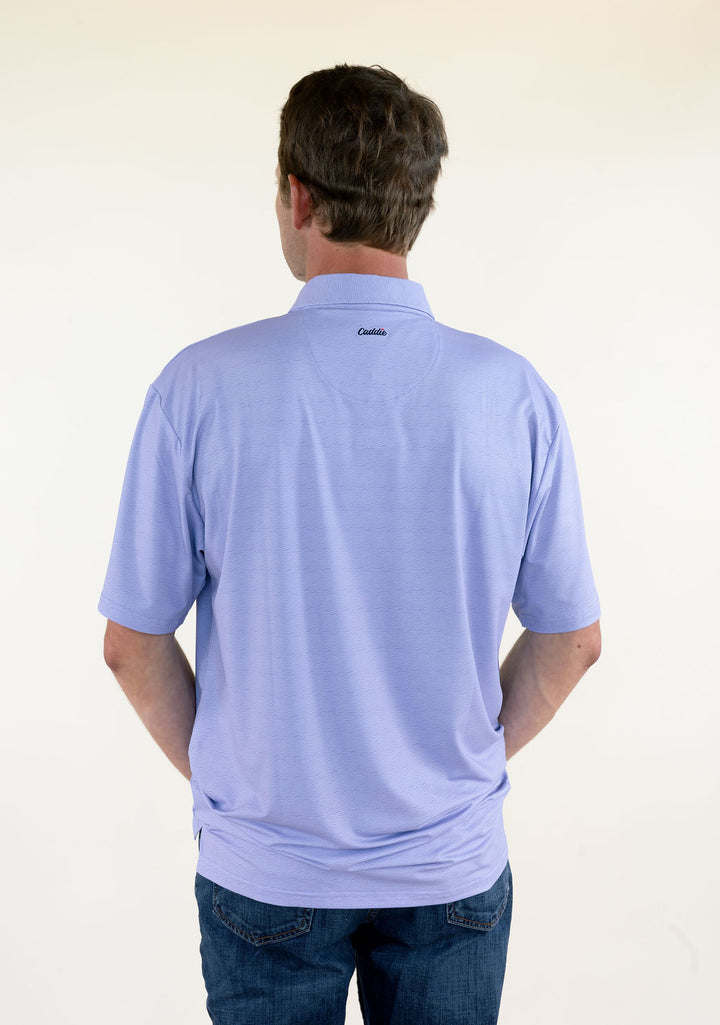 Back view of light lavender short sleeve performance polo showing the classic collar, relaxed silhouette, and clean solid design