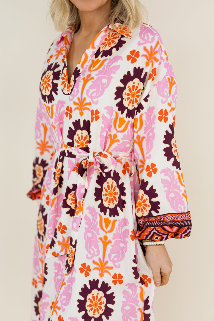 Side detail of THML Marigold Bloom long sleeve floral midi dress