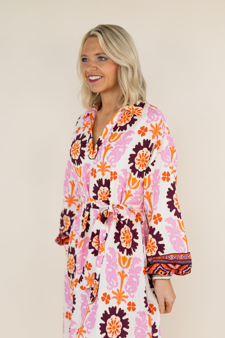 Side view of THML Marigold Bloom floral tie waist midi dress
