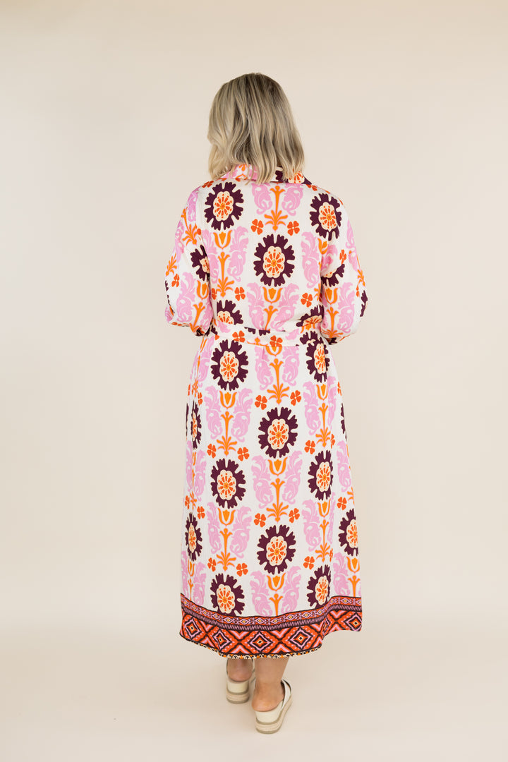 Back view of THML Marigold Bloom long sleeve floral midi dress