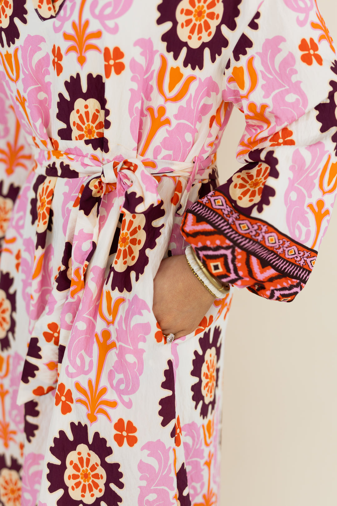 Close-up of balloon sleeve and floral print on THML Marigold Bloom midi dress