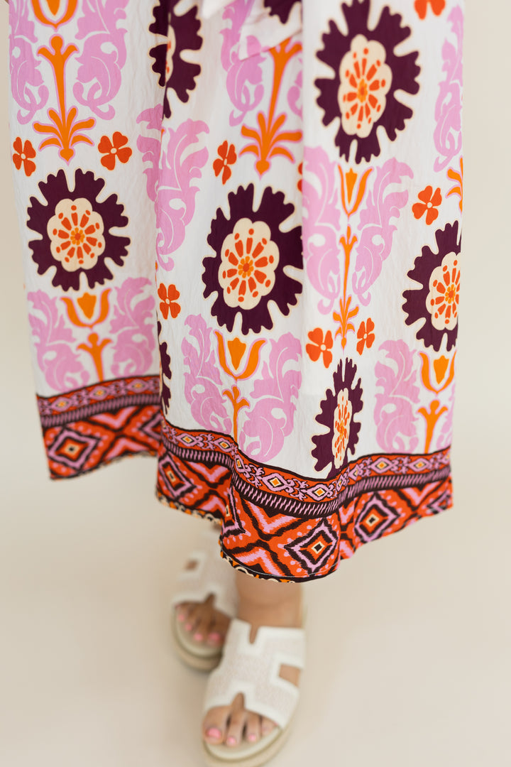 Hem detail of THML Marigold Bloom midi dress with contrasting border print