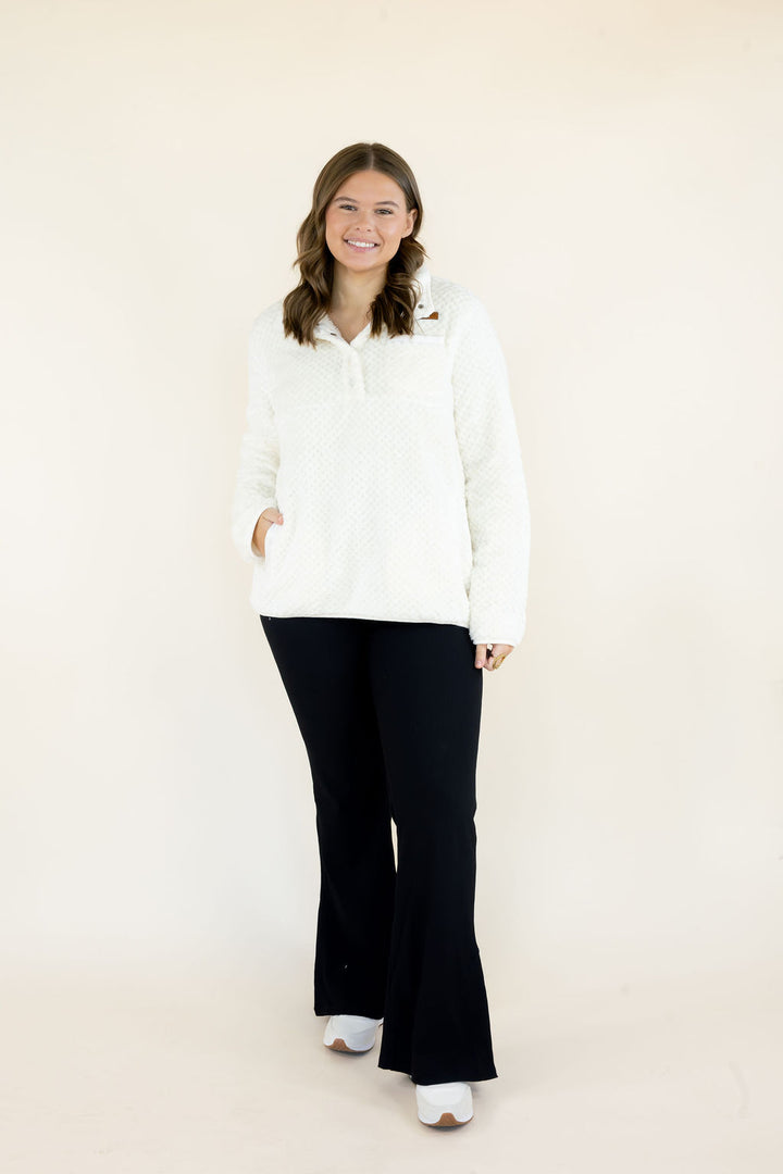 Simply Southern ivory Simply Soft Pullover with snap-button collar and front pockets, styled with black flare leggings and white sneakers.