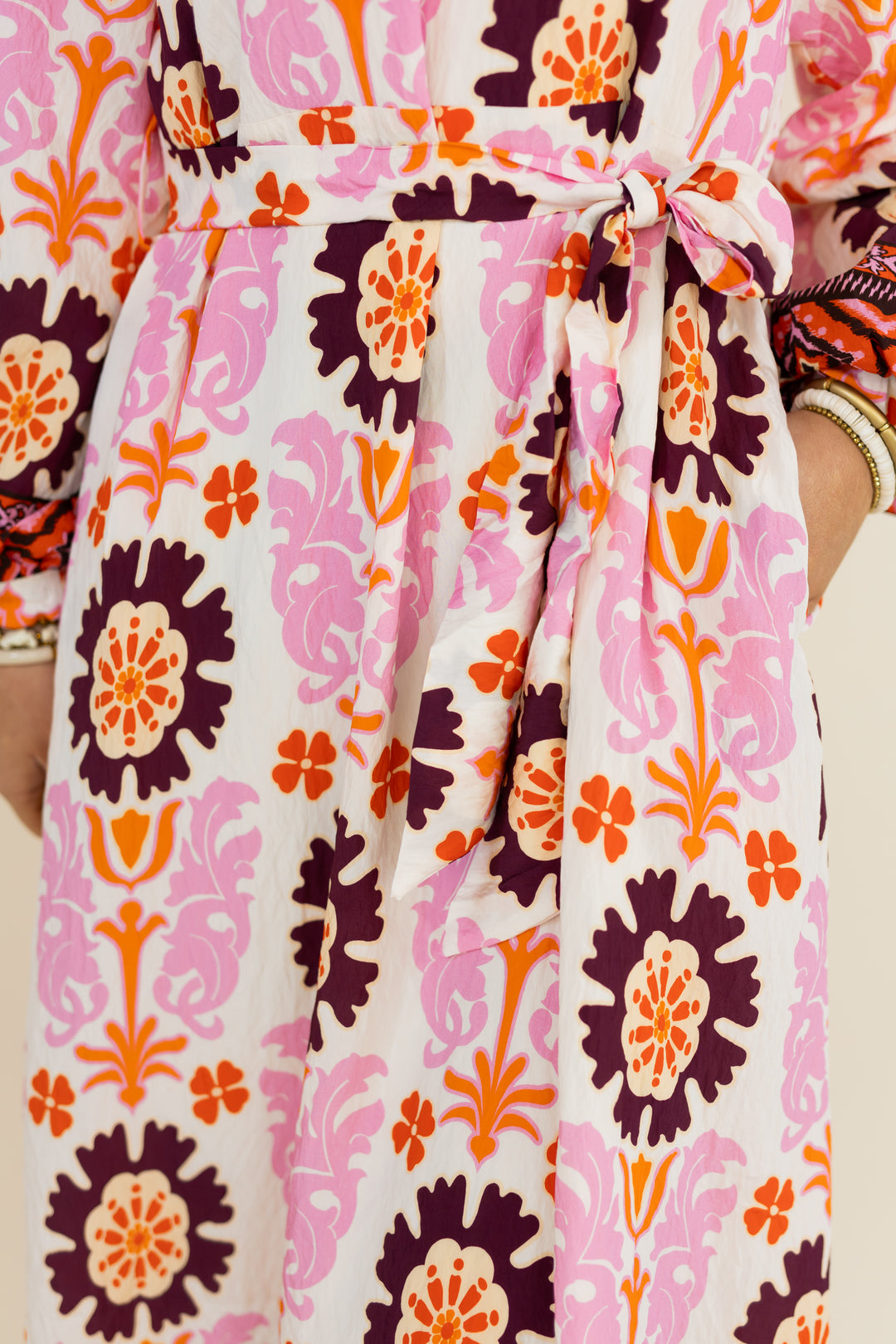 Close-up of self-tie waist on THML Marigold Bloom floral midi dress
