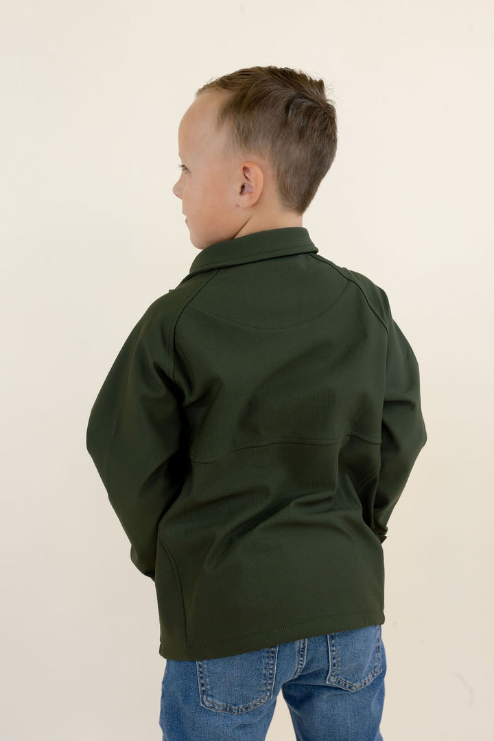 Three-quarter back view of youth model wearing the green Dogwood quarter zip pullover showing the rear silhouette and elastic hem.