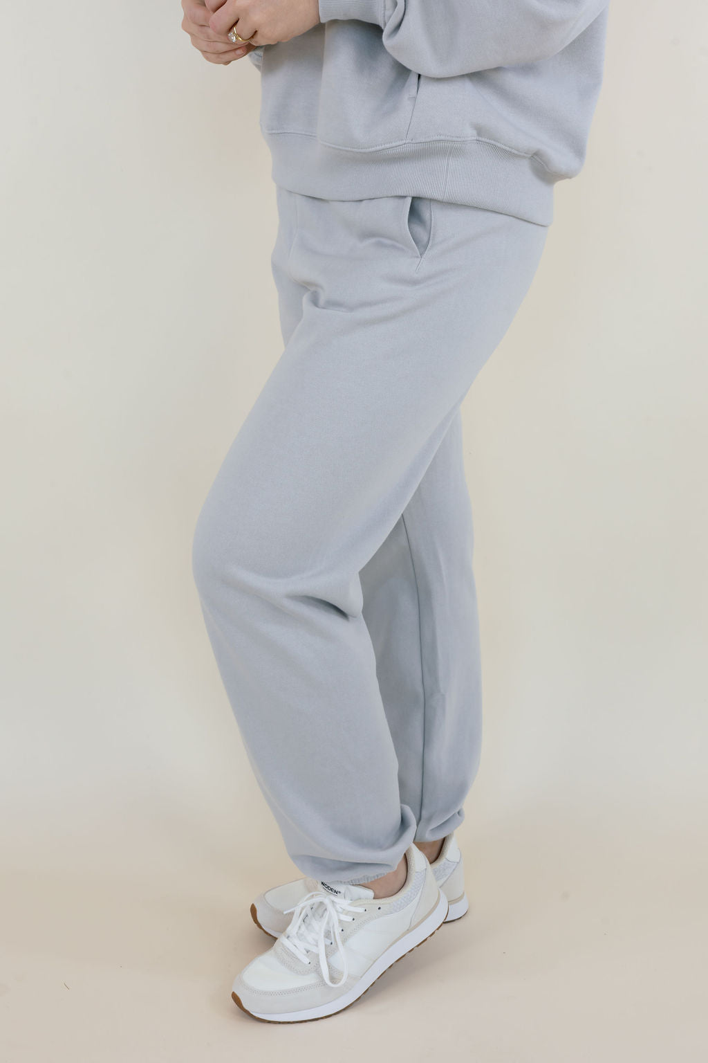 Side close-up of Silverlake fleece jogger sweatpants featuring a relaxed silhouette, side seam pocket, and elastic ankle cuffs.