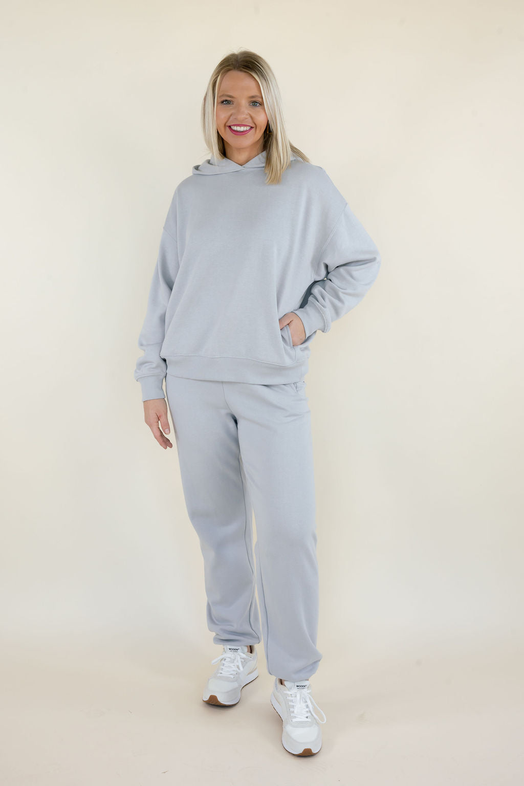 Full-length front view of First Quarter Hoodie in Silverlake styled with matching fleece joggers and white sneakers, showing relaxed oversized fit.