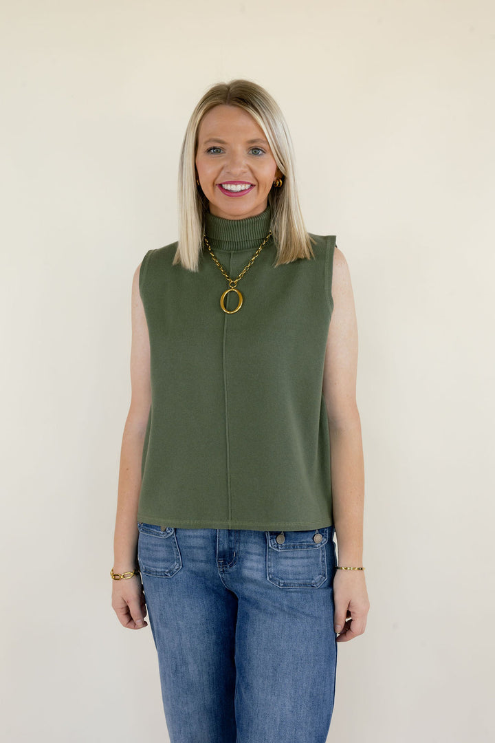 Front view of olive green sleeveless mock neck sweater top featuring a structured high neckline, relaxed fit, and gold statement necklace