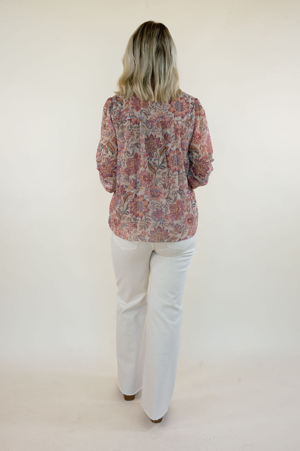 Full-length back view of women&