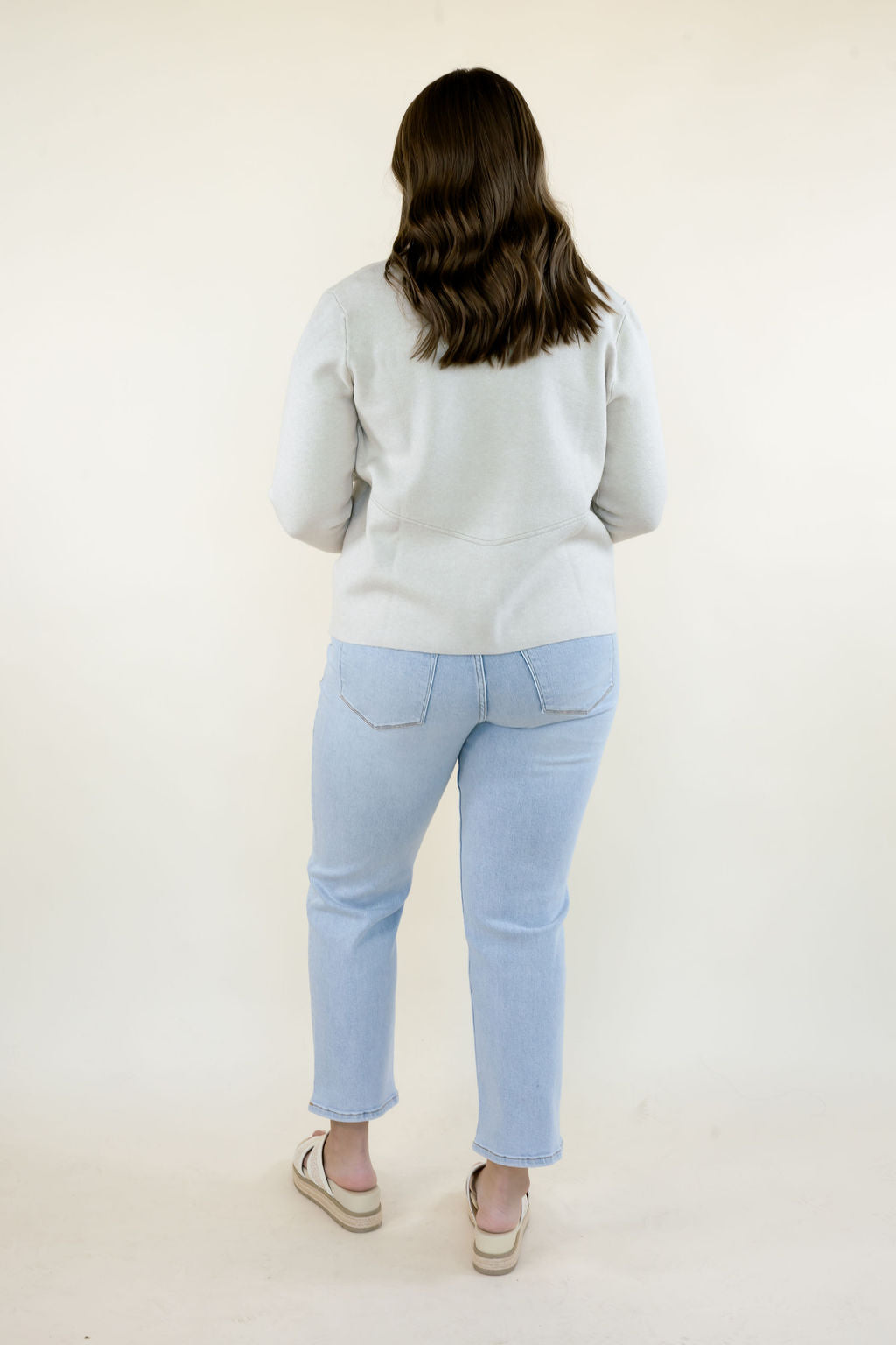 Full-length back view of women&
