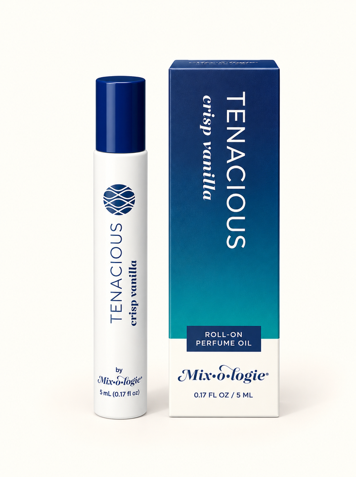 Mixologie Tenacious Crisp Vanilla 5 mL roll-on perfume oil with navy blue cap and blue-to-teal gradient packaging on a cream background.
